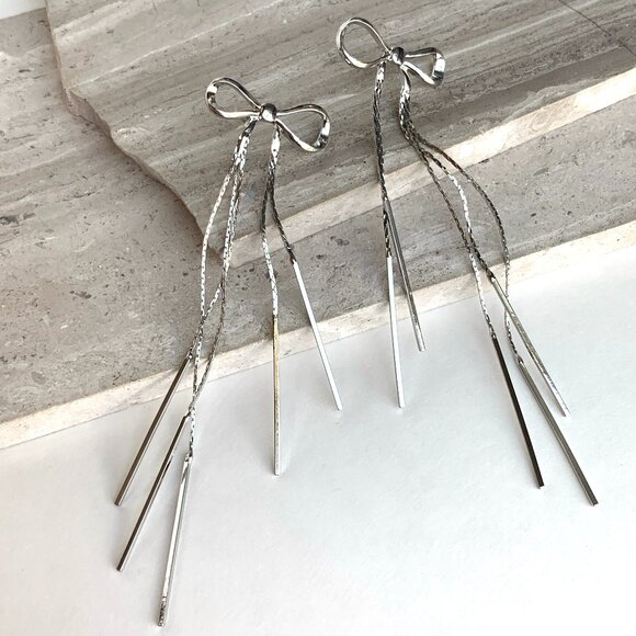 NEW~ Anthropologie Casa Clara "Ava" Long Fringe Bow Drop Silver Earrings - Picture 1 of 11